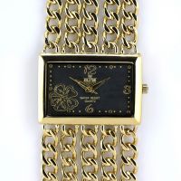 Dámské společenské hodinky na řemínku z řetízků. Číselník je zdobený květinkou W02M.10598 - W02M.10598.D