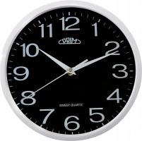 Klasické hodiny PRIM v čistém designu v plastovém provedení s arabskými číslicemi se strojkem s plynulým chodem E01P.3988 v černé barvě