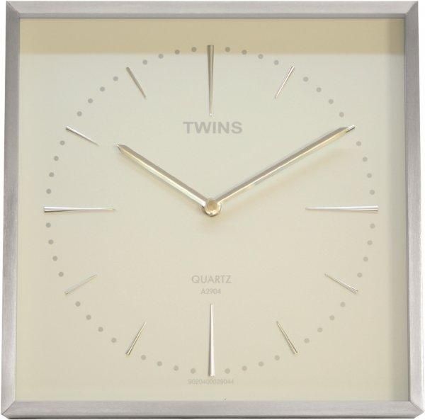 Nerezové kovové nástěnné hodiny čtvercového tvaru rakouské výroby Twins