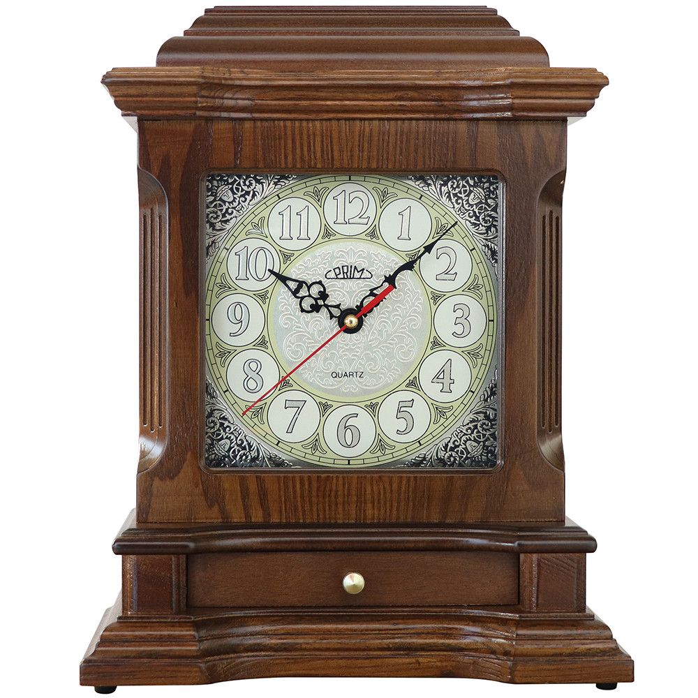 Originální dřevěné stolní hodiny PRIM Old Times s číselníkem zdobeným ornamenty, které Vás svým retro vzhledem přenesou do dávných časů. Jsou vybaveny důmyslnou malou zásuvkou pro - PRIM Old Times