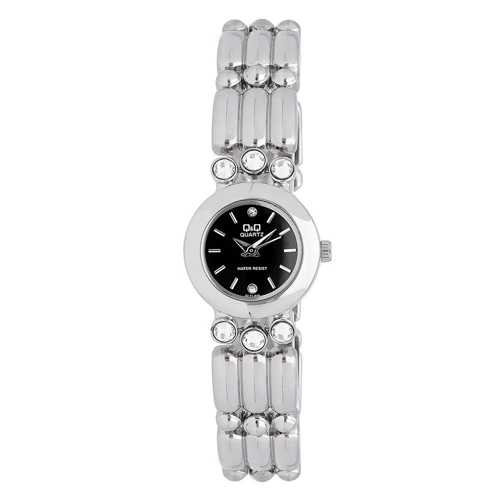 Základní model dámských módních hodinek Q&amp;Q Lucy s ocelovým tahem. Hodinky jsou vyrobeny v kombinaci nerezové oceli a kovu. Pouzdro hodinek a řemínek jsou osazeny šesti skleněnými kam Q&Q Lucy - A