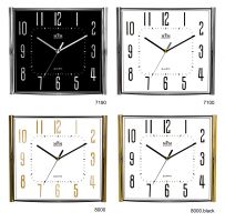 Elegantní plastové nástěnné hodiny ve zlatém/stříbrném decentním rámečku E01.3175